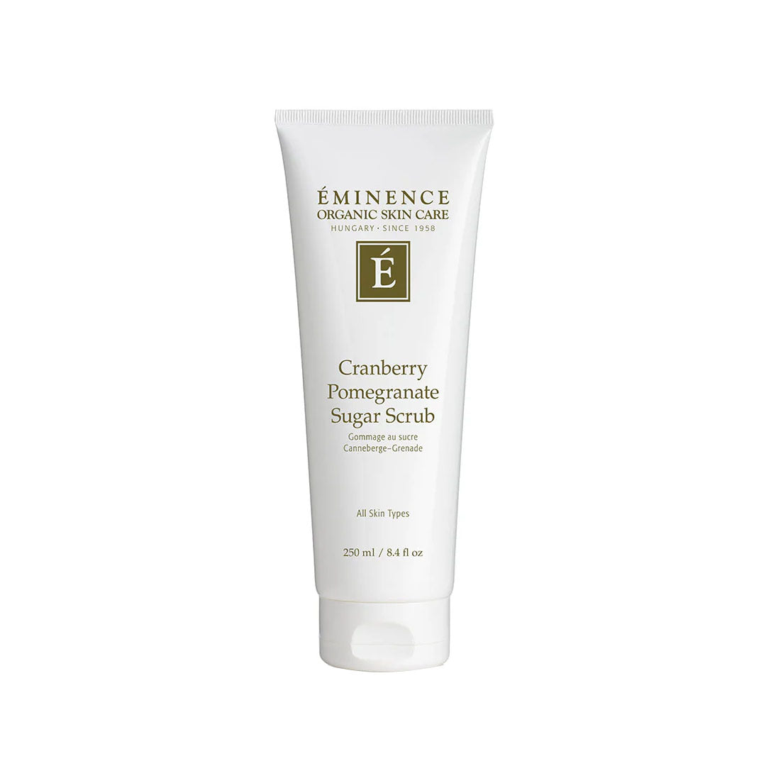 8.4 oz white squeeze tube of Eminence Cranberry Pomegranate Sugar Scrub with dark green branding and text.