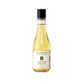Eminence Stone Crop Body Oil in a clear 240ml glass bottle with a black cap and white label against a white background.