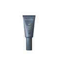 Face Reality 5% Glycolic Serum in a matte slate blue 30ml squeeze tube with a minimalist white label.