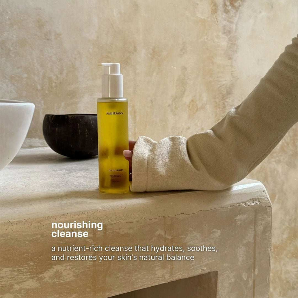 Bottle of Daily Restorative Cleansing Oil for gentle, nourishing skincare cleansing and exfoliation
