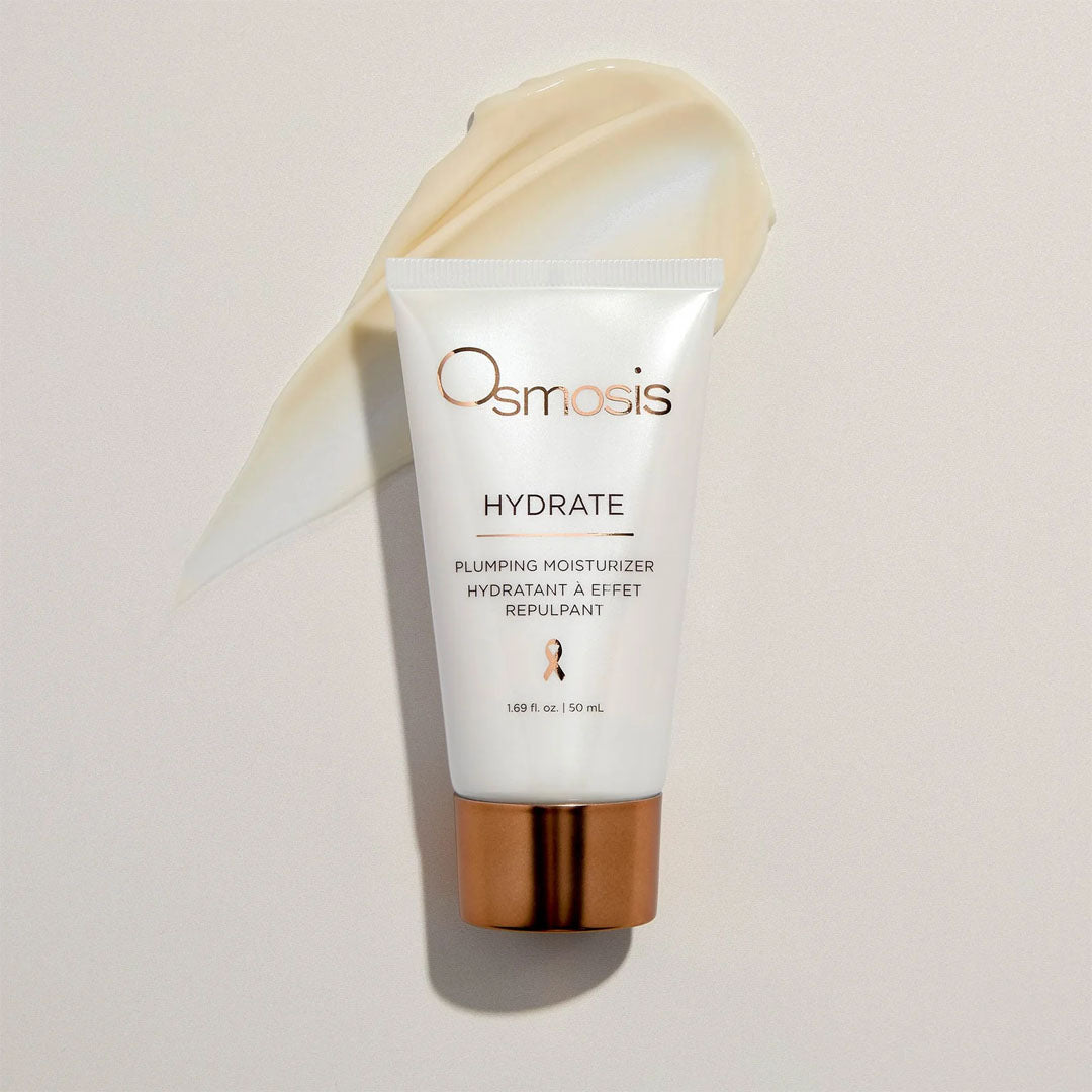 White Osmosis Hydrate Plumping Moisturizer tube with copper cap, a creamy swatch behind it.