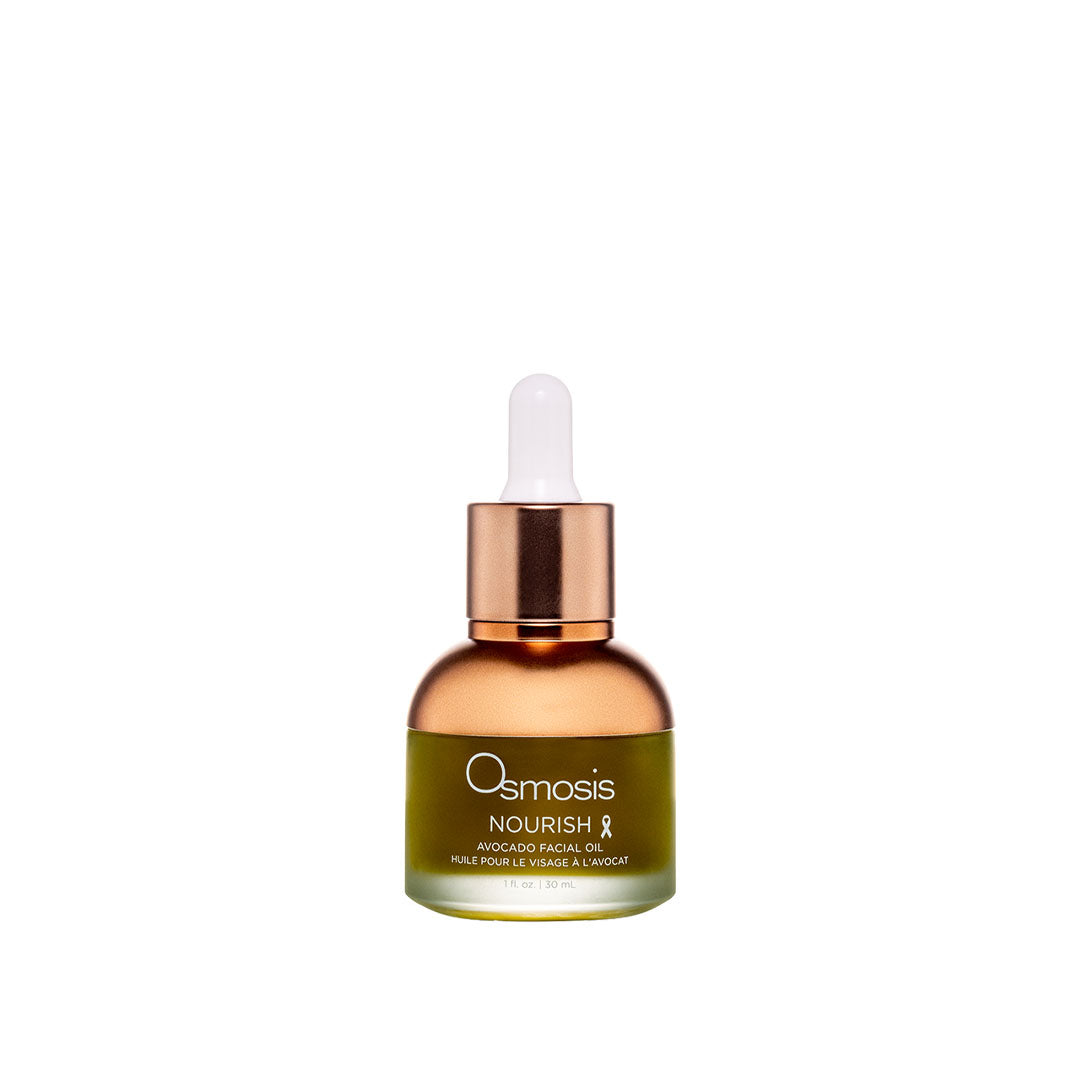Nourish Avocado Facial Oil bottle with fresh avocado and green leaves for skin hydration and radiance