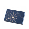 Dark blue Stellar Travel Kit box with a large gold starburst design and smaller gold stars.