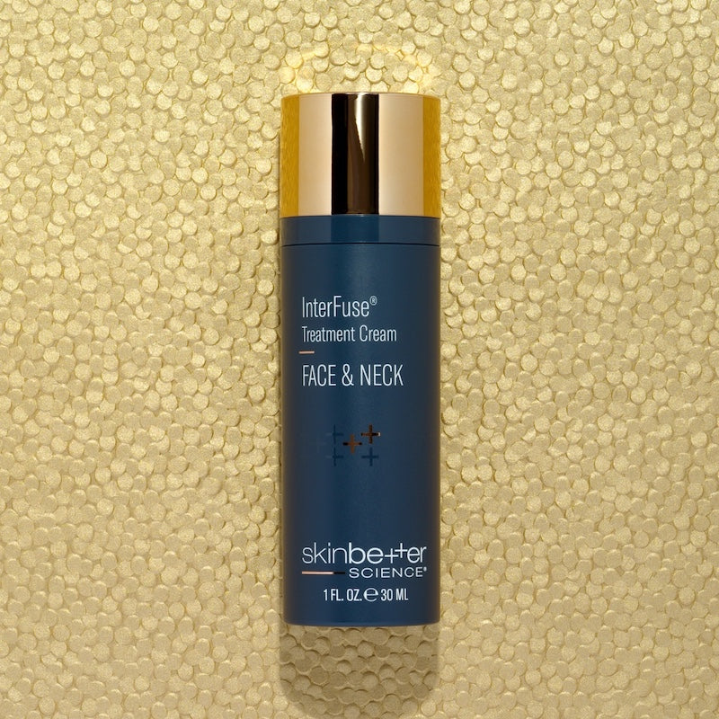 skinbetter interfuse intensive treatment face and neck cream on gold glitter background