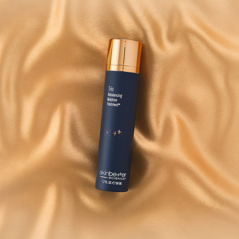 skinbetter trio rebalancing moisture treatment gold silk background