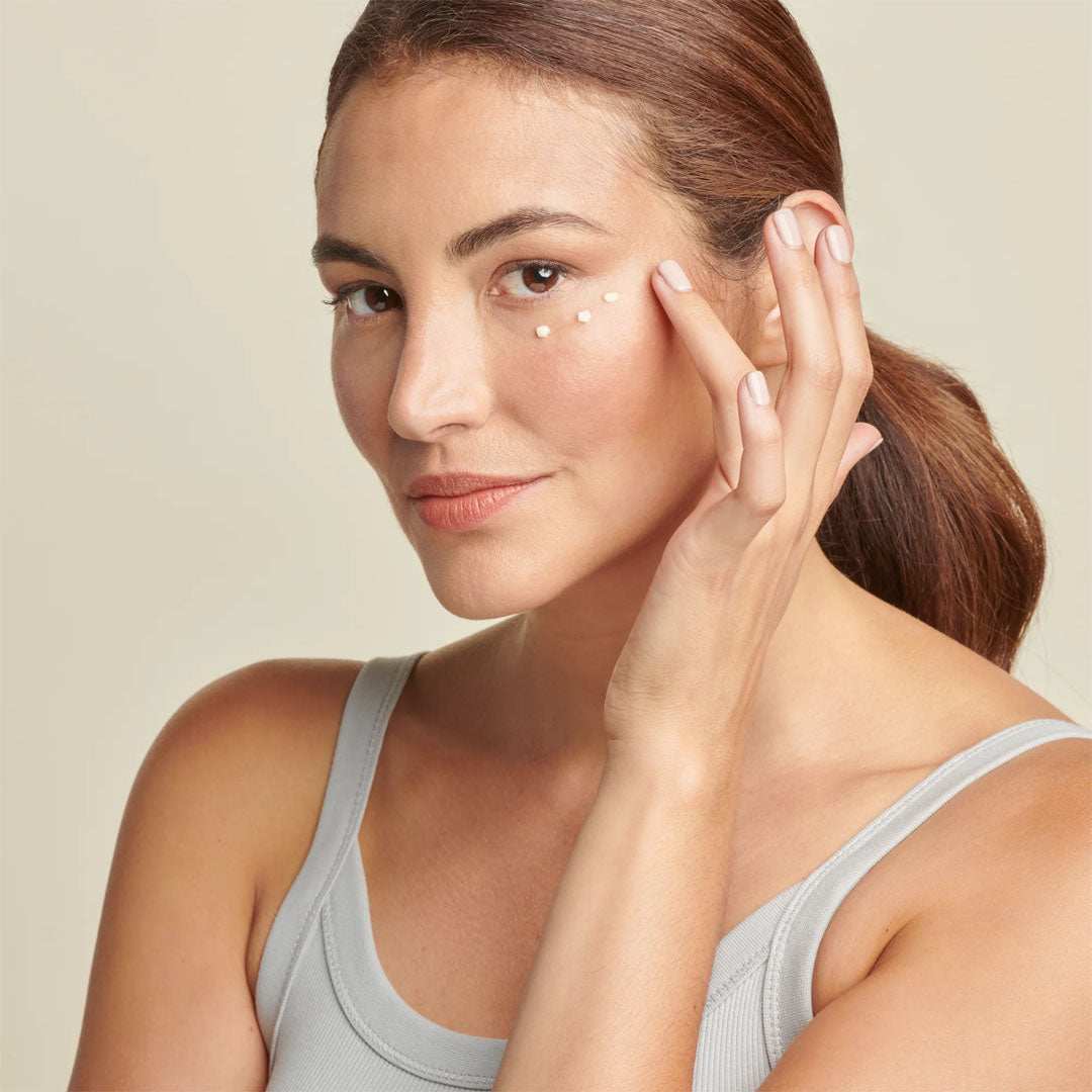 Total Eye® Firm & Repair Cream jar with key ingredients for firming and brightening under-eye skin